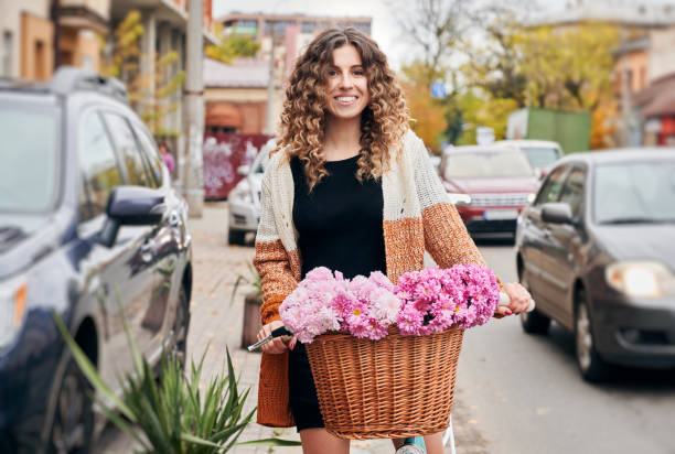 istock Brunette travelling by retro bicycle on street. 1337414673