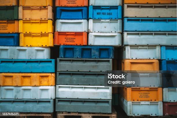 Colorful Old Plastic Crates For Fish Stock Photo - Download Image
