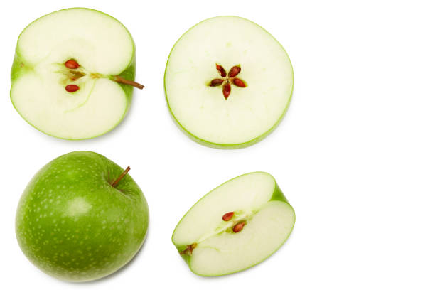 istock green apples with green leaf and slices isolated on a white background. clipping path. top view 1337417435