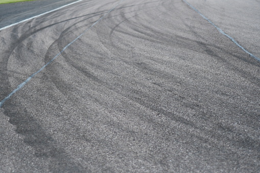 Racing, automotive, bike circuit showing the skid marks from the tyres