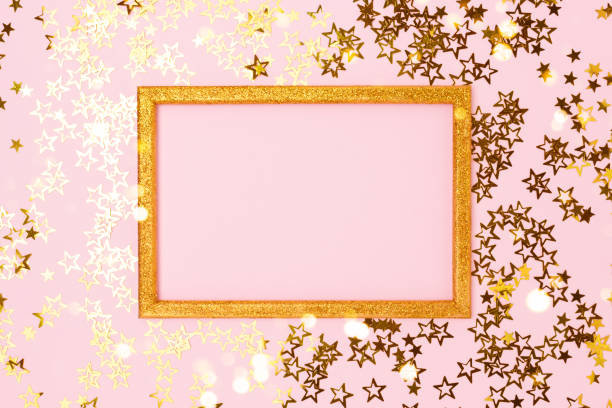istock Glittering empty frame with gold stars confetti. 1337424135