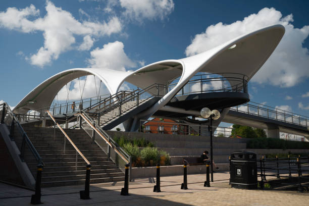 View of the Lowry outlet mall at Salford Quays Manchester, UK  People can be seen on the promenade
