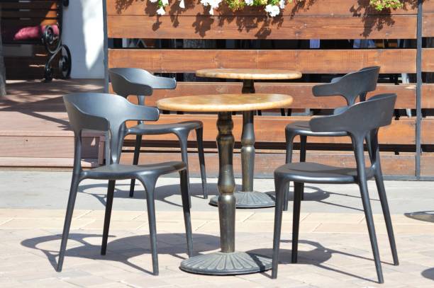 istock Tables and chairs in a cafe 1337424601