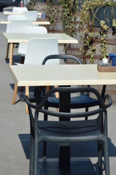 istock Tables and chairs in a cafe 1337424615