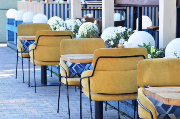 istock Tables and chairs in a cafe 1337424635