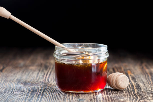 istock old table on which there is a healthy and sweet bee honey 1337427930