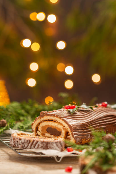 istock Traditional Christmas cake, chocolate Yule log with festive decorations 1337430366