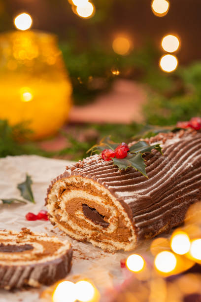 istock Traditional Christmas cake, chocolate Yule log with festive decorations 1337431100