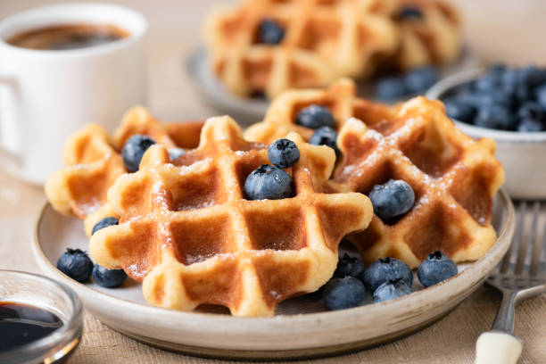 istock Belgian waffles with blueberries on plate 1337432205