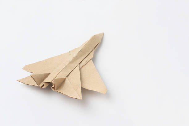 istock Origami paper airplane mockup. Selective focus. 1337435845
