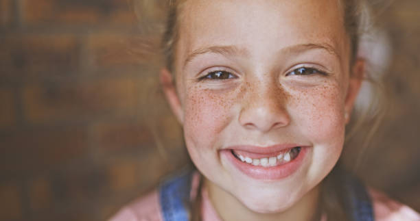 Shot of a young girl at home stock photo