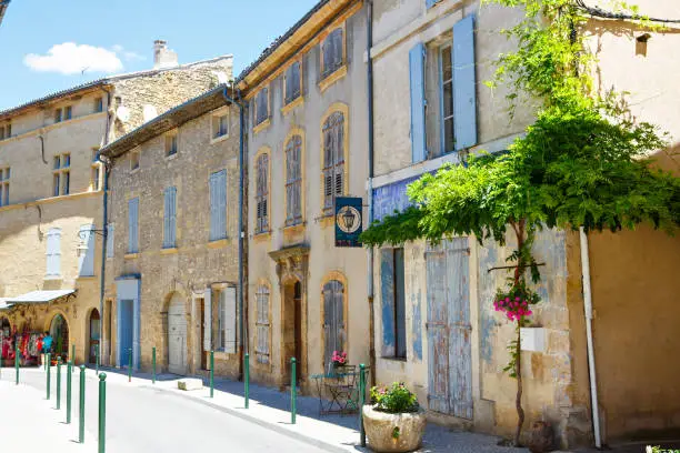 Provencal street with typical houses in southern France, Provence. Aix-en-Provence city on sunny summer day
