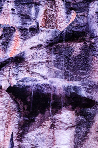 A Pebble Crete Driveway after it has been raining giving this glossy wave wet look of the pebble Crete driveway