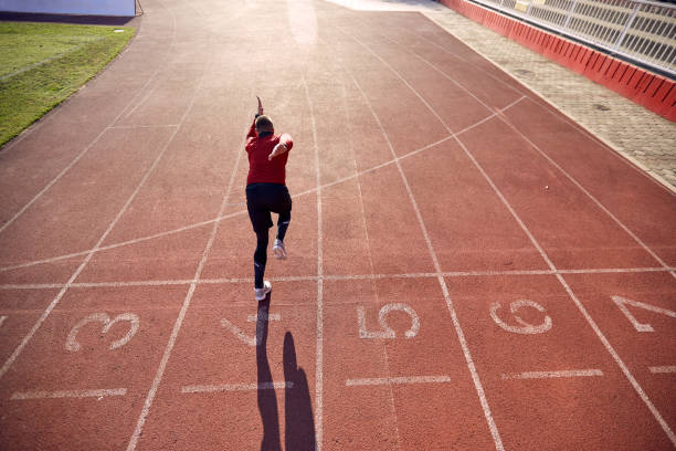 istock man sprinter run on track stadium in athletics competition 1337442355