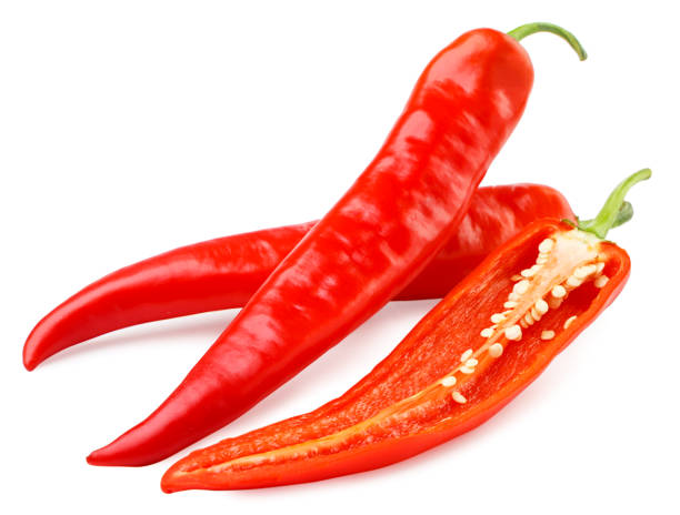 istock Two red peppers and half on a white background. Isolated 1337442479