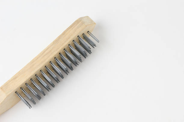 Brush with metal pile for brushing wood. Hand tool