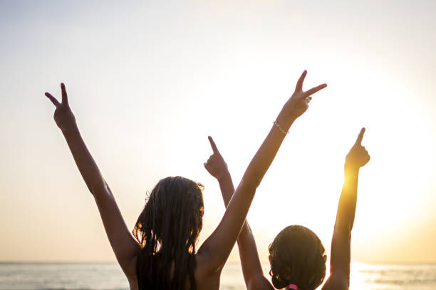 istock Sisters enjoyment to summer time 1337443591