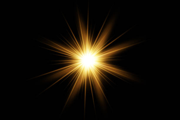 istock A set of light effects, golden stars, glittering particles. The sun is shining. 1337443697