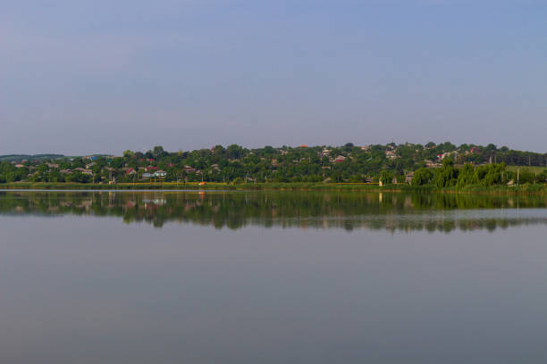 istock A small village by the river. 1337444033