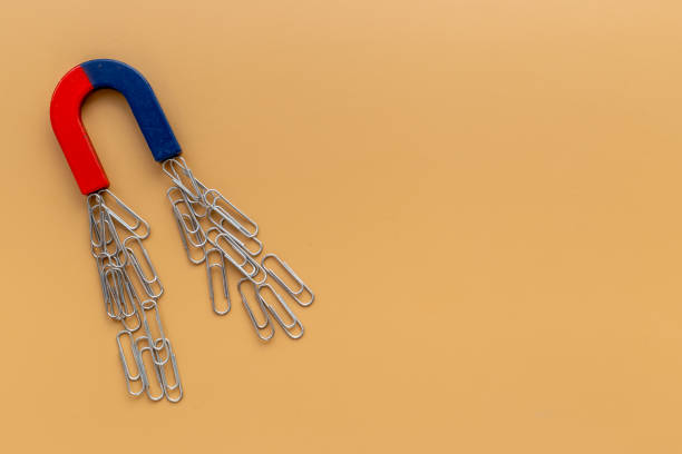 istock Magnet with paper clips. Office supplies top view 1337444323