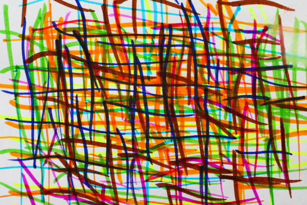 istock Chaotic strokes of multi-colored felt-tip pens on a paper surface 1337444418