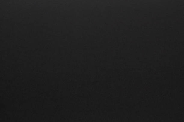 istock surface of colored paper as background for black friday 1337444446