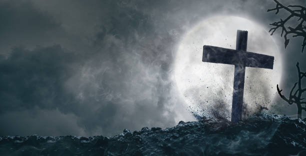 istock Graves and crosses with the moon in the background 1337444581