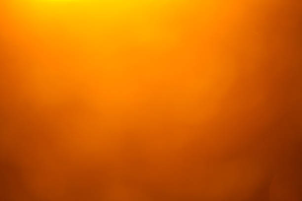 istock Abstract orange and yellow colored background 1337451096