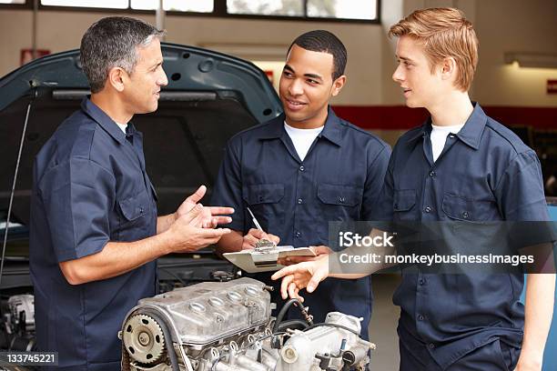 Mechanic Training Apprentices Stock Photo - Download Image Now - Mechanic, Education Training Class, Auto Repair Shop