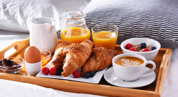 istock A tray with breakfast on a bed in a hotel room 1337452424