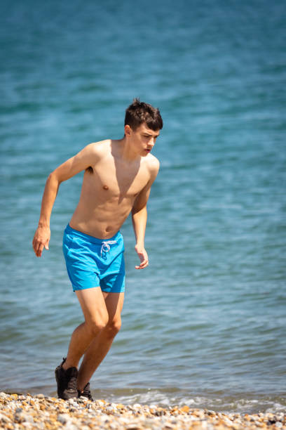 istock Running on a beach next to the sea 1337455897