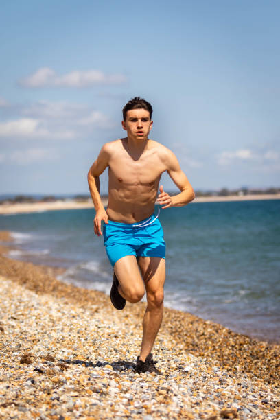 istock Running on a beach next to the sea 1337455939