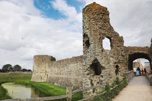 Pevencey, England - August 27, 2021: Pevensey Castle is a medieval castle and former Roman Saxon Shore fort at Pevensey in the English county of East Sussex.