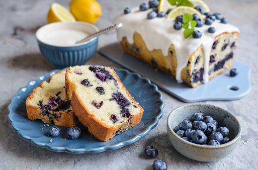 Fresh lemon blueberry loaf of bread cake with sugar glaze