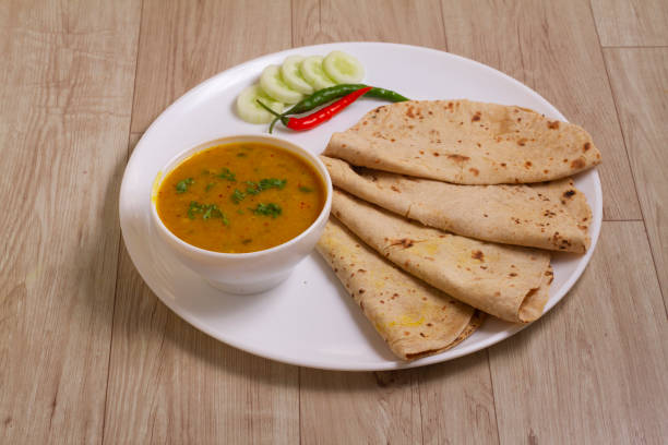 istock daal and chapati on a wooden background. selective focus. 1337466212