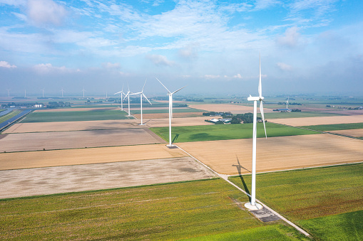 Wind Turbines in a grain Field, drone shot