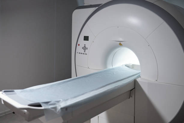 istock MRI scan with long table for patient standing in medical laboratory 1337470126