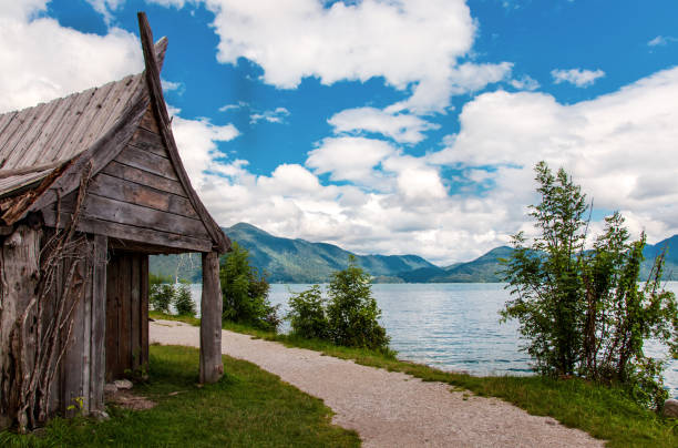 wooden house on the lake. viking village at the lake walchensee. upper bavaria, bavarian prealps, germany. - walchensee lake imagens e fotografias de stock