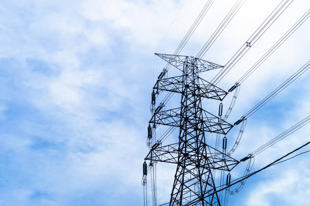 istock High voltage electric pole with power line electricity engineer distribution station. 1337471731