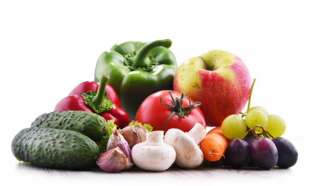 istock Composition with fresh vegetables and fruits isolated on white 1337473232