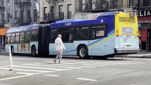 Bus Turns Corner in New York City