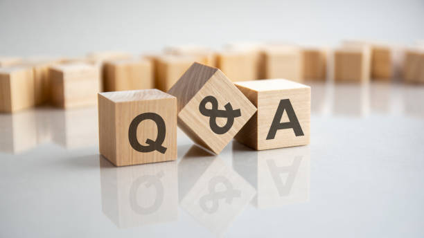 q and a - question and answer shot form on wooden block - questions and answers stockfoto's en -beelden