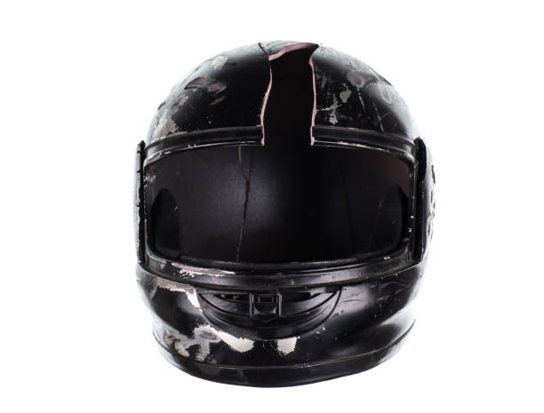 istock broken motorcycle helmet isolated on white background 1337478879