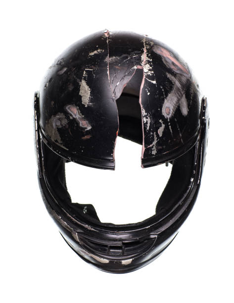 broken motorcycle helmet isolated on white background