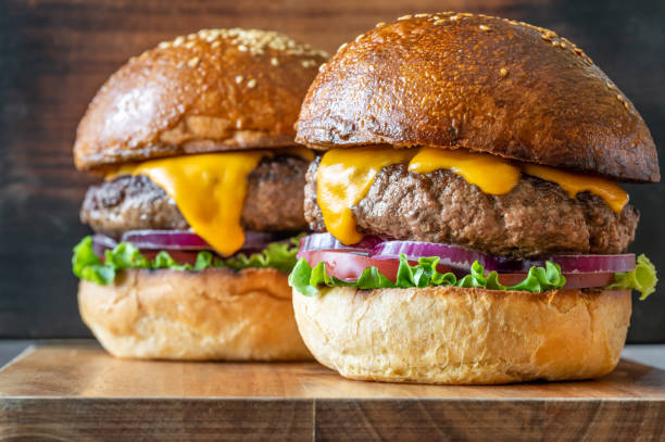 istock Burgers on the wooden board 1337481104