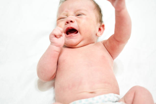 istock A crying newborn baby boy 1337483354