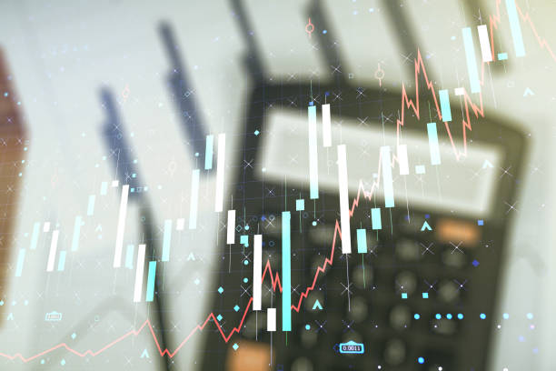 istock Double exposure of abstract creative financial chart hologram on blurry calculator background, research and strategy concept 1337483877
