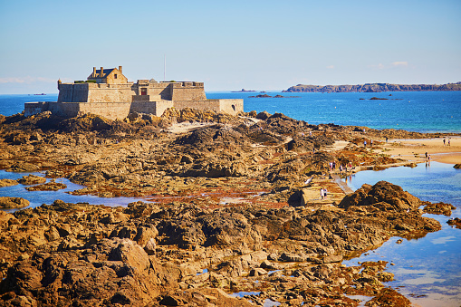 Scenic view of beaches and coastline in Saint-Malo, Brittany, France. Photo taken from the wall surrounding Saint-Malo Intra-Muros at low tide