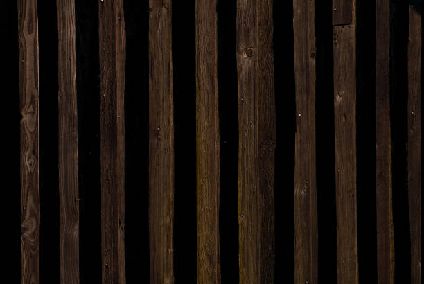 istock Wall texture with striped paneling. Wood paneling close up. 1337488825