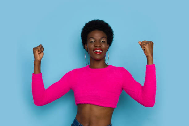 istock Confident Black Woman Standing With Fists Clenched 1337491136